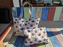 Load image into Gallery viewer, Handgefertigte Kosmetiktasche oder als Handtasche zu nutzen, blau gemustert, 37x25cm
